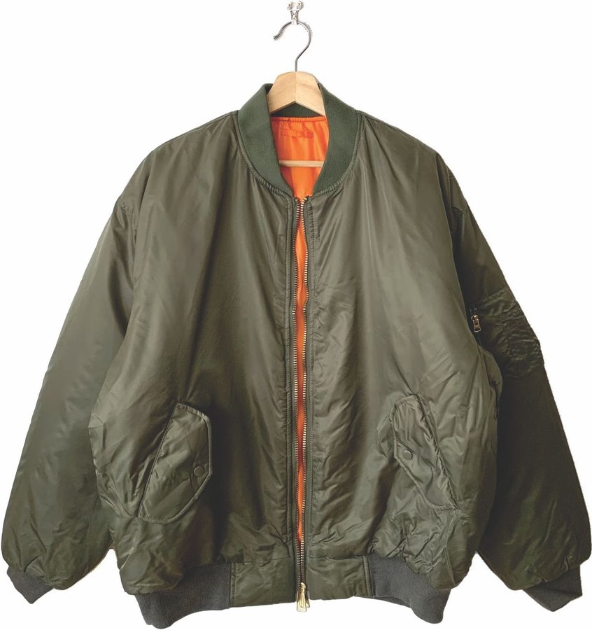 MA-1 bomber jacket, sage green shell with orange lining
