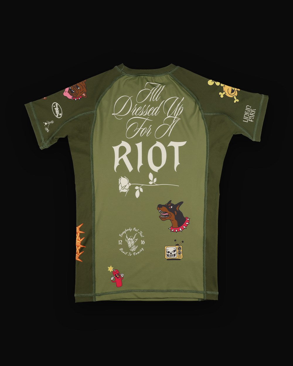 No-gi rashguard, green colorway, studio flat-lay, &ldquo;All Dressed Up For A Riot&rdquo; back print